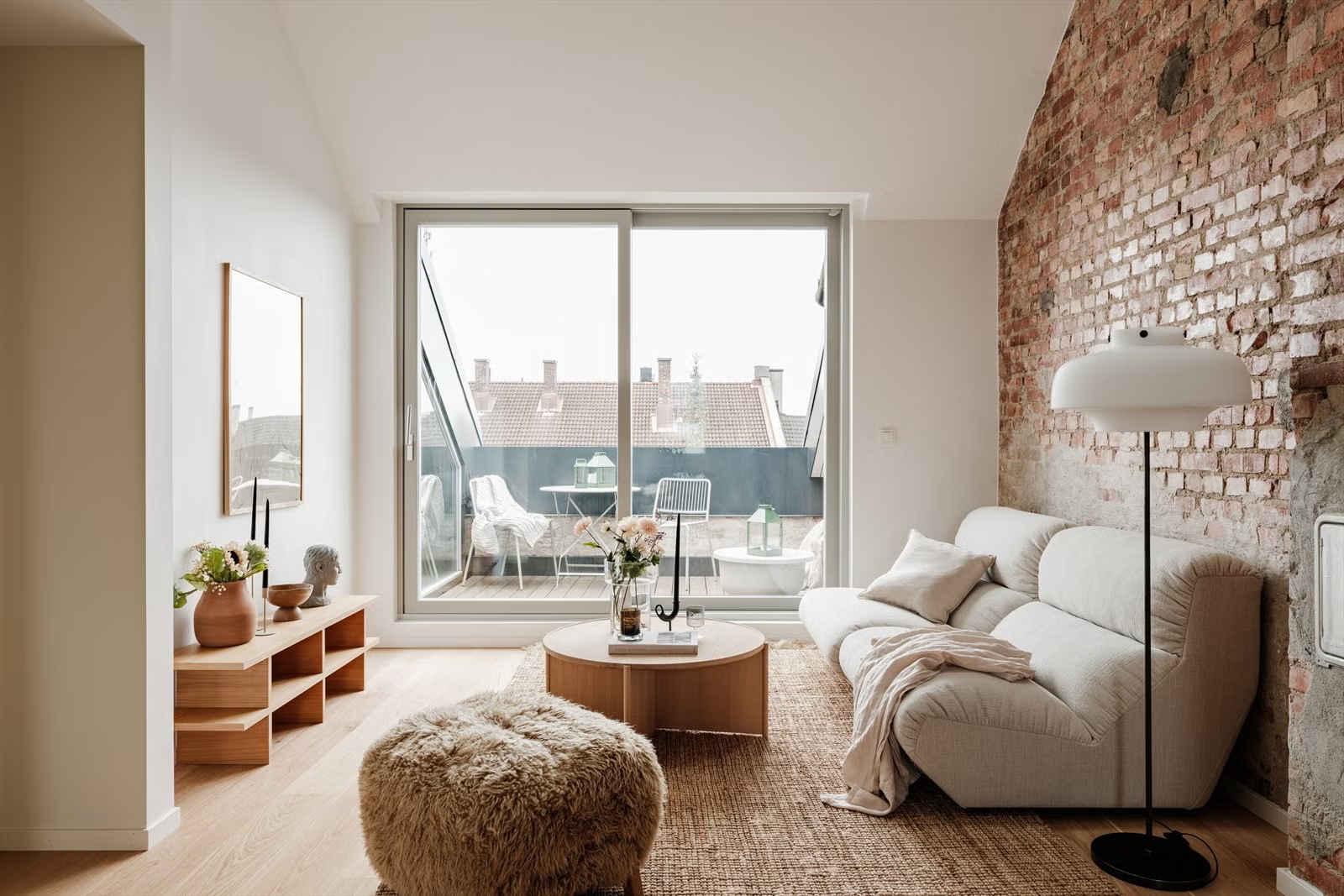 Living room of Living Under the Sky attic apartment in Oslo, interior design by IK-architects