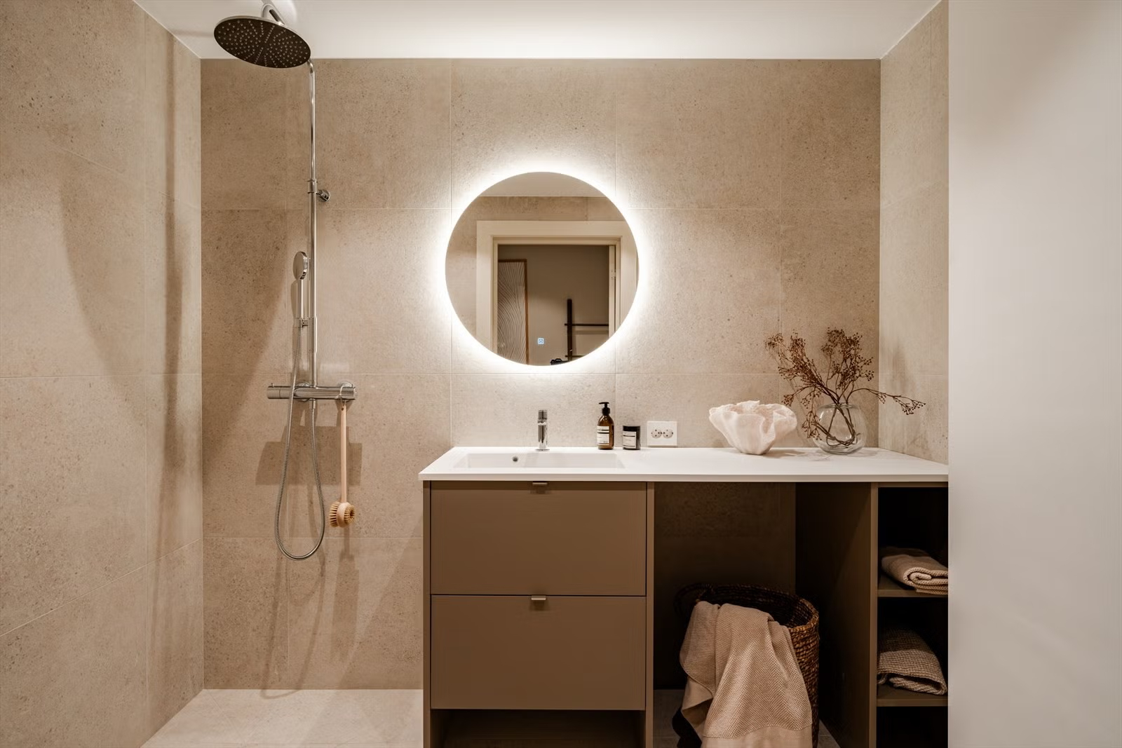 Minimal bathroom with walk-in shower in the Living Under the Sky attic apartment in Oslo by IK-architects